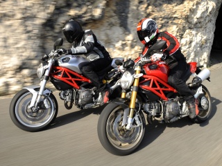 2009 Ducati Monster - Silver 1100 &amp; Red 1100S: The Ducati Monster 1100 in Silver and the 1100S in Red, fun in any color.
